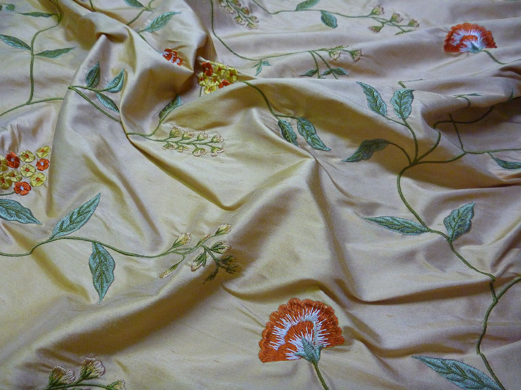 Embroidered silk-flower cream